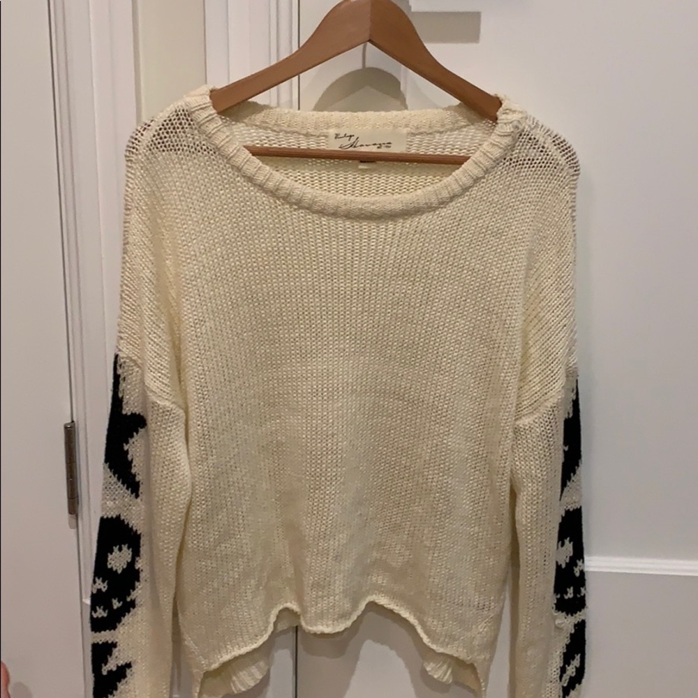 cute sweater with detail on sleeves